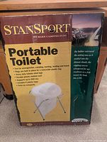 Retail box front for Stansport portable folding toilet