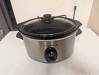 Front view of HomeMax slow cooker showing lid and control dial