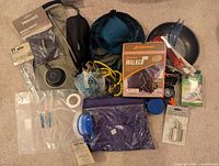 Group view of all camping items laid out on floor