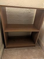 medium brown open bookshelf front view