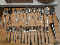 Overview of all flatware and vase on table