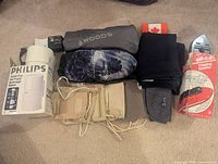 Group shot of all travel items laid out on carpet