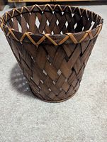 Exterior view of woven wood wastebasket