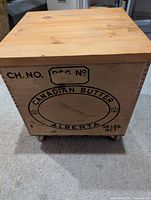 Front view showing Canadian Butter Alberta branding and wheels