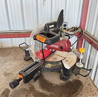 Front angle view showing full miter saw on base