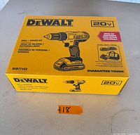 Front of sealed box showing DeWALT 20V MAX DCD771C2 drill/driver image