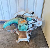 Overall view of Makita LS1000 miter saw on floor