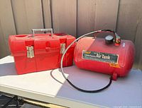 Air tank and toolbox on table