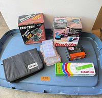 Overview of all seven items on blue tote lid