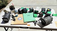 All items laid out on table showing quantity and variety of gauges, modules, manual and accessories