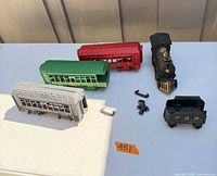 Overview of all train pieces, figure and couplers