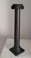 Full view of candlestick showing entire form and base