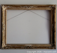 Full view of rectangular gold wood frame front