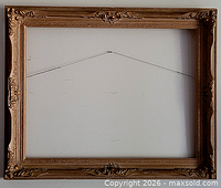 Front view of carved gilt wood frame