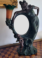 Full view of figural lamp unlit