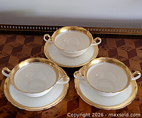 Set of three two-handled bowls with three saucers showing complete lot
