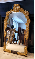 front view of ornate baroque-style mirror