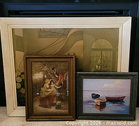 Group shot of three framed prints upright