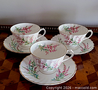 Three teacups and three saucers arranged to display pattern and shape