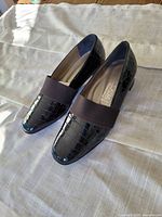 top view of both shoes showing croc texture and elastic band