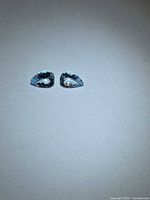 Both pear-cut aquamarines front view