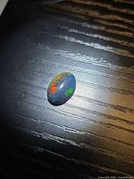 Top view of opal showing play of colour