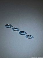 Four marquise-cut sky blue topaz gemstones angled
