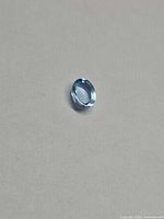 Front view of oval Swiss blue Topaz cabochon