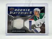 Front view of card inside protective top-loader