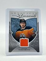Front of card showing player image and orange jersey patch