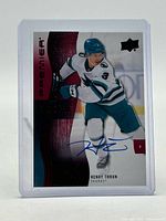 Front view of Henry Thrun Premier rookie autograph card in sleeve