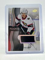 Front of card showing player image, Rookie designation, patch window