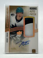 Front of Henry Thrun Rookie Auto Patch card showing autograph, patch, serial number