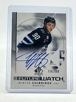 Front of card showing autograph, serial number 776/999, SP Authentic logo, player image