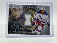 Front of card showing player image, hourglass jersey swatch and set branding