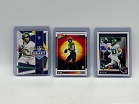 Three Bo Nix rookie cards in sleeves