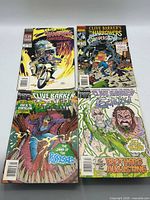 All four comic books laid out