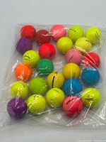 Bag containing 25 multicolour golf balls