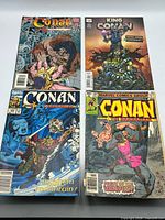 All four comic books front covers