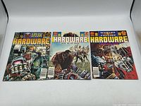 Three Hardware comic books laid flat covers visible