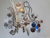Full layout of assorted jewelry pieces on tabletop