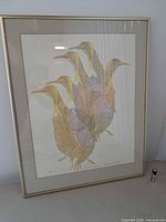 Full view of framed lithograph showing artwork, mat and frame