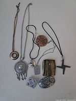 All nine jewelry pieces laid out