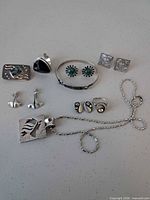 Full group of all sterling pieces laid out