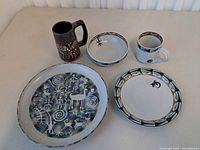 All six stoneware pieces laid out