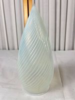 Full view of spiral ribbed opalescent teardrop shade