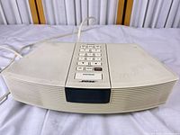 Front view of Bose Wave Radio showing display and speaker grille