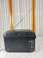 Front view of GE Superadio radio with extended antenna