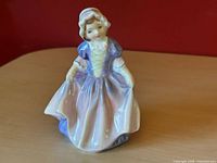Front view of Royal Doulton Dinky Do HN1678 figurine