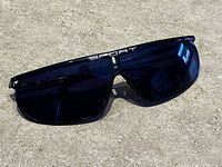 Front view showing shield lens, SPORT text, black frame